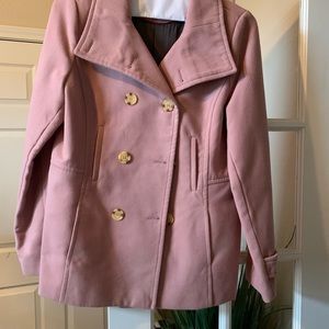 Light pink button down coat.